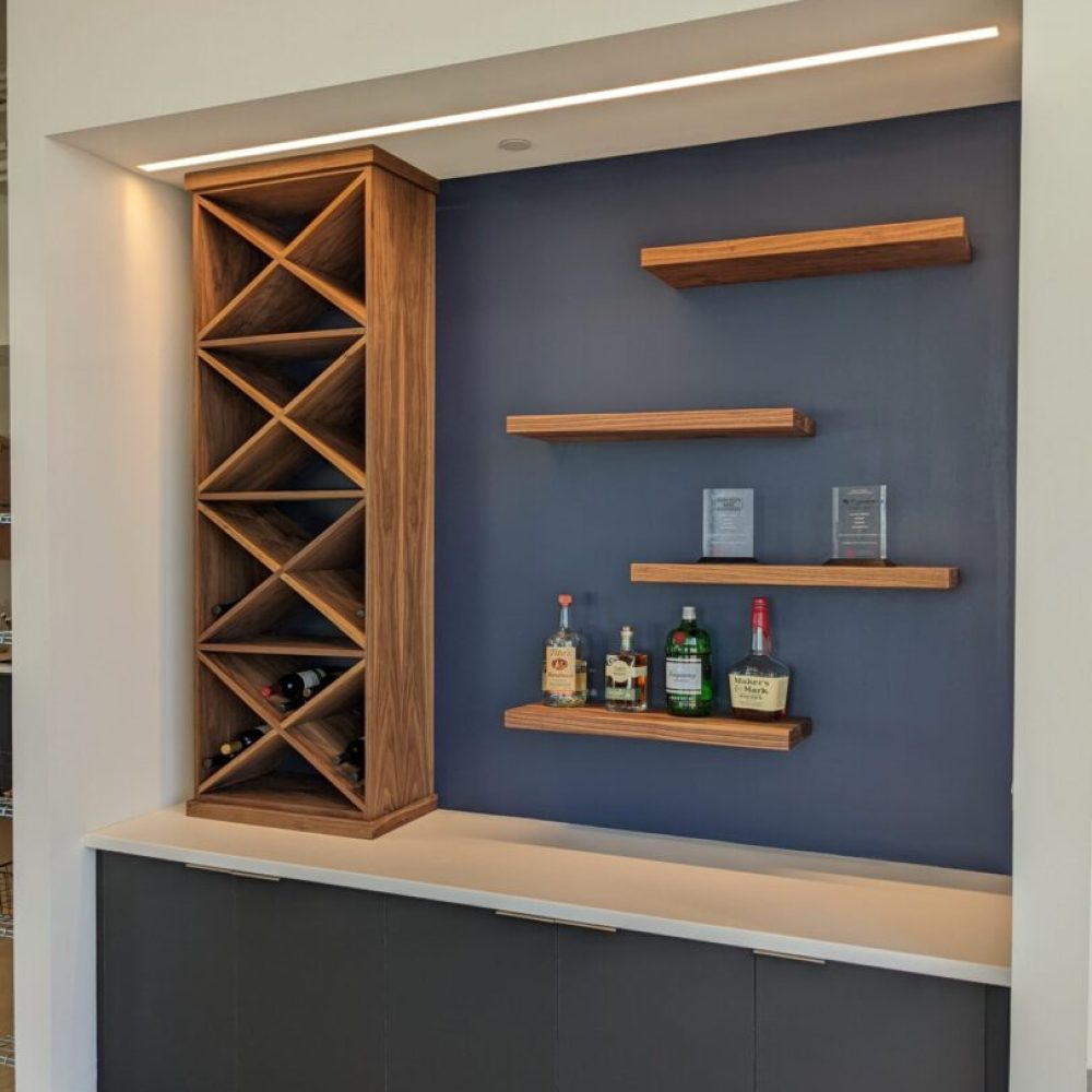 Modern bar with wine rack and shelves.